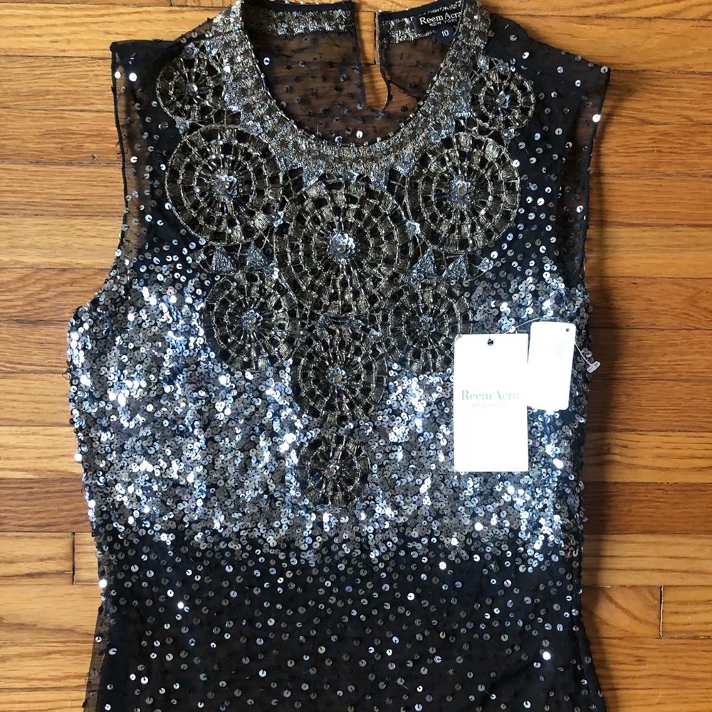 Reem Acra sequence black top. Never worn.
